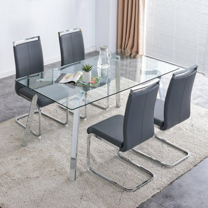 A Modern Minimalist Rectangular Glass Dining Table With Tempered Glass Tabletop And Silver Metal Legs, Suitable For Kitchens, Restaurants, And Living Rooms, 63"*35.4"*30"